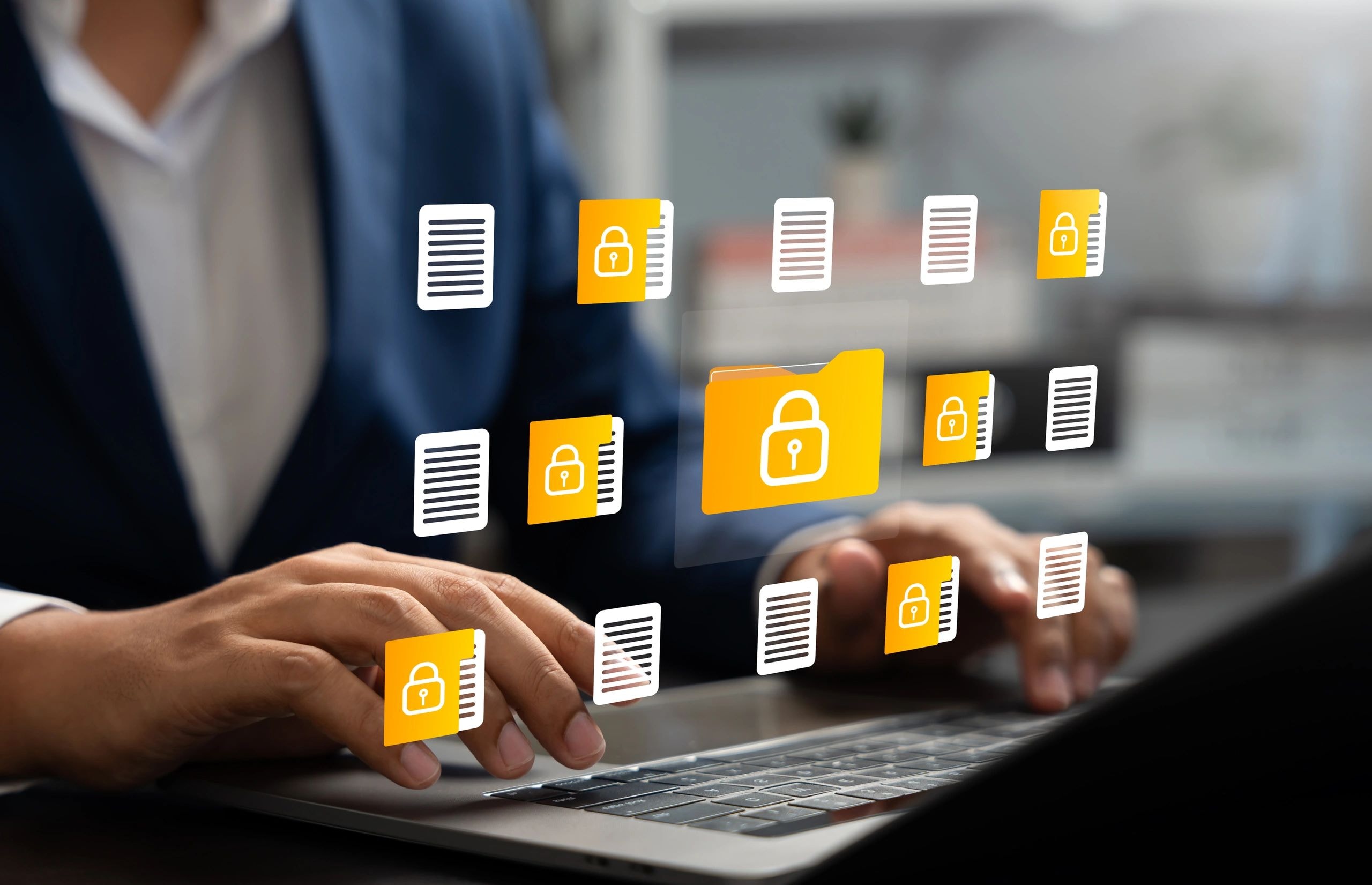 Person managing encrypted digital files on laptop